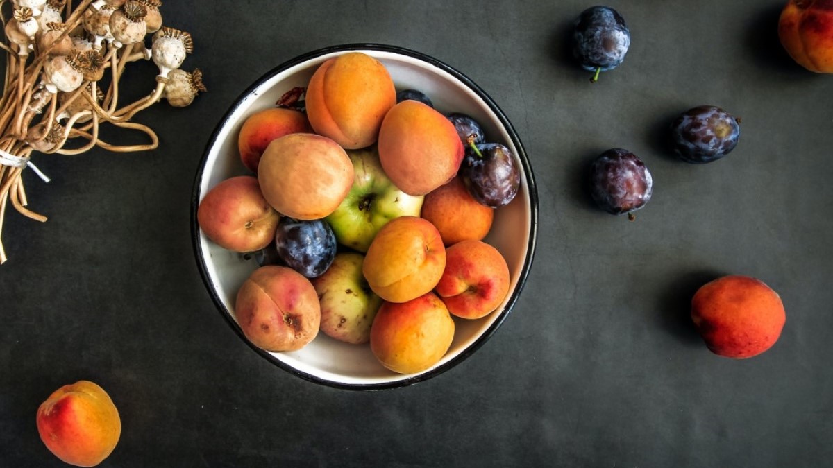 Fresh Peaches and Plums Photo credit: Nordwood Themes on Unsplash